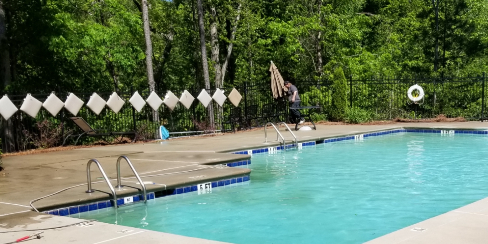 cleaning pool pressure washing after
