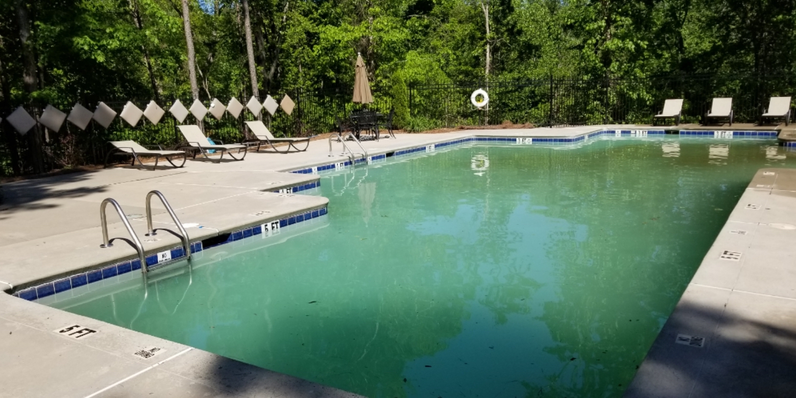 cleaning pool pressure washing before