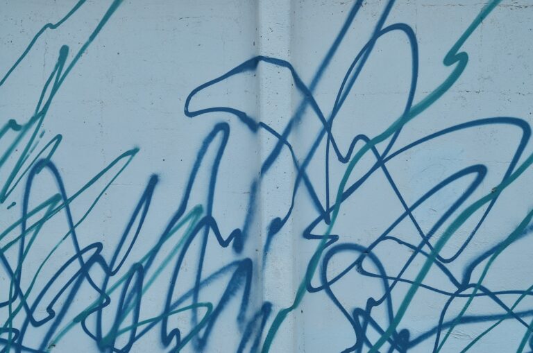 Multicolored graffiti on an old concrete wall