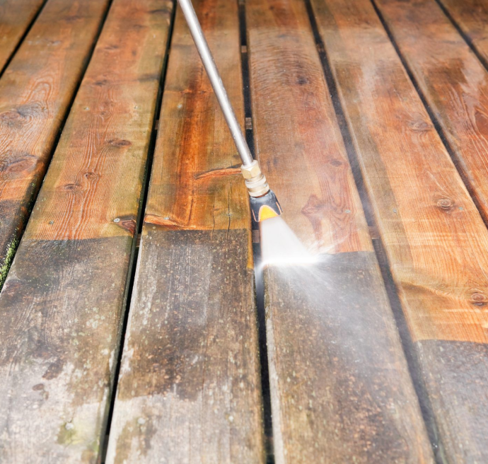 Pressure washing a deck for mildew and mold