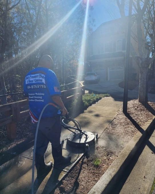 Commercial Pressure washing concrete sidewalks for mildew and mold at a HOA in Suwanee, Georgia