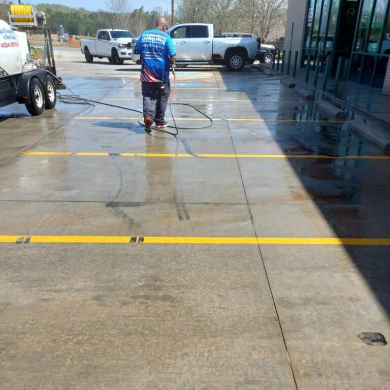 Commercial Pressure washing At A Parking Lot for grime and dirt in Dawsonville, Georgia