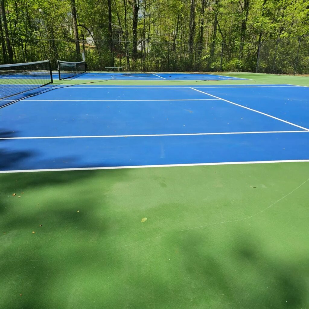Tennis court Cleaning using our soft washing technique for mildew and mold in Alpharetta, Georgia